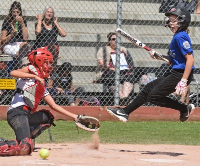 Talia gets hit vs Nanaimo July 14 2015.jpg